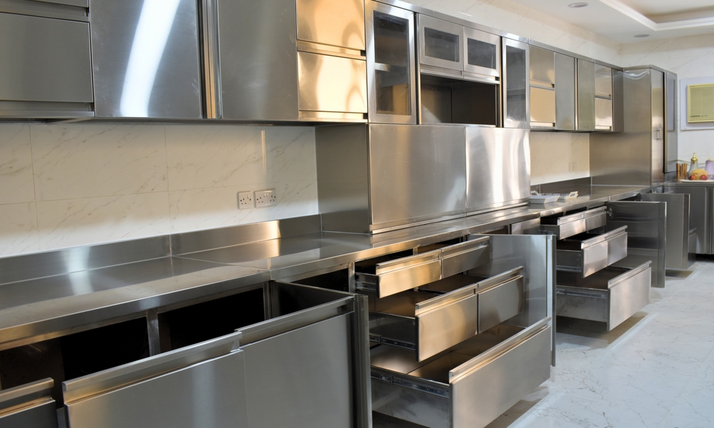 Custom,Made,Stainless,Steel,Kitchen,With,Storage,Cabinets. Commercial kitchen installation with stainless steel cabinets and countertops.